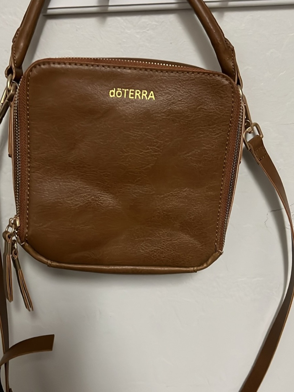 Doterra Cognac Brown Faux-Leather Crossbody Bag with Gold Logo